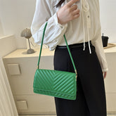 Bolso de hombro con patron de rayas cruzadas