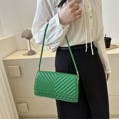 Bolso de hombro con patron de rayas cruzadas